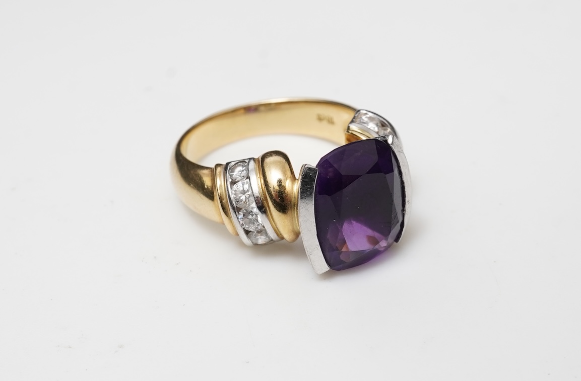 An amethyst and diamond ring